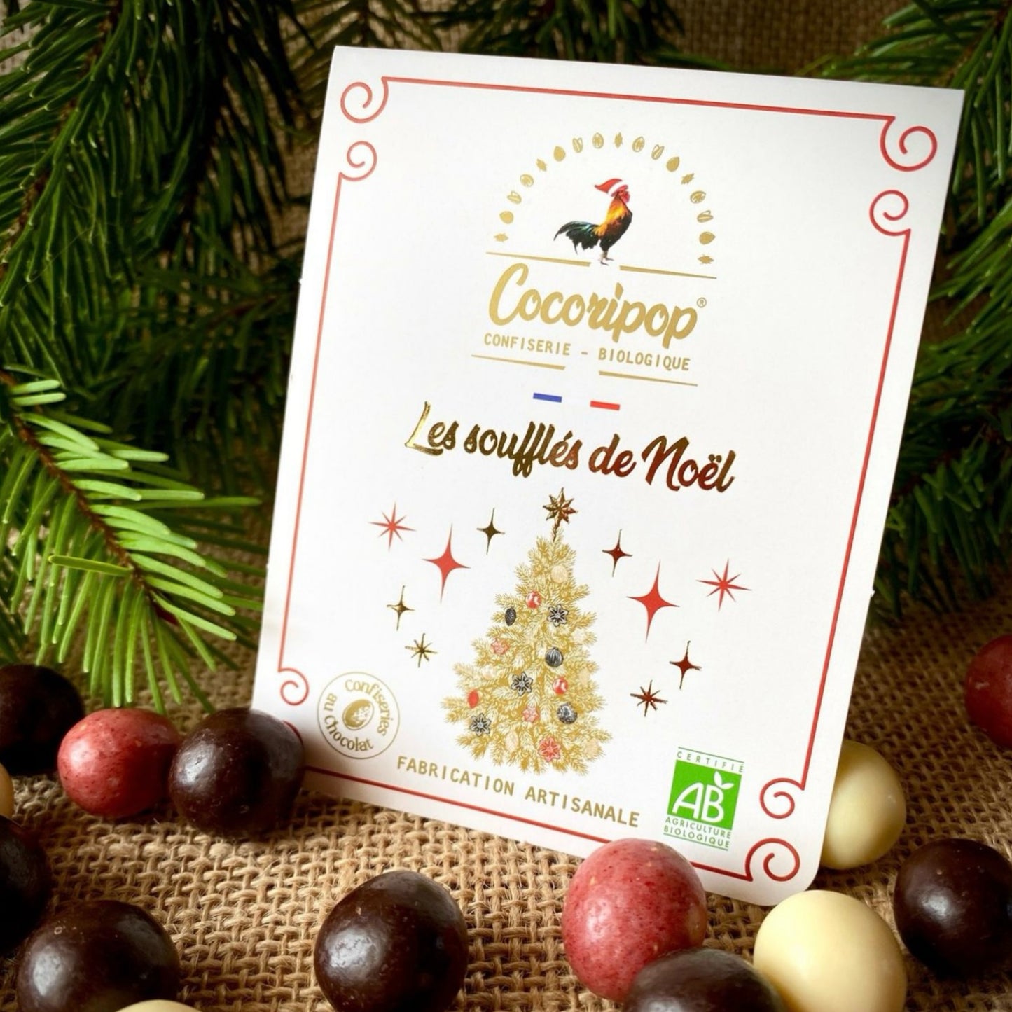 Billes de cereales bio trois chocolats dont un chocolat rouge a la fraise, creation artisanale de Noel Cocoripop