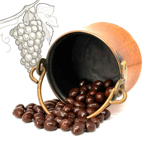 Raisin d'Or en vrac, raisins secs macérés dans des vins français (Sancerre, Muscadet, Sauternes) et enrobés de chocolat noir bio, confiserie artisanale fabriquée à Brécy.