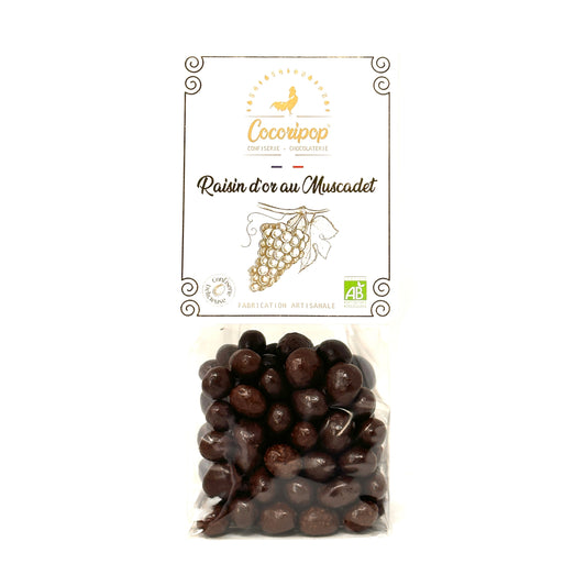 Raisins secs macérés dans du vin blanc Muscadet et enrobés de chocolat noir bio, confiserie artisanale Cocoripop fabriquée en France.