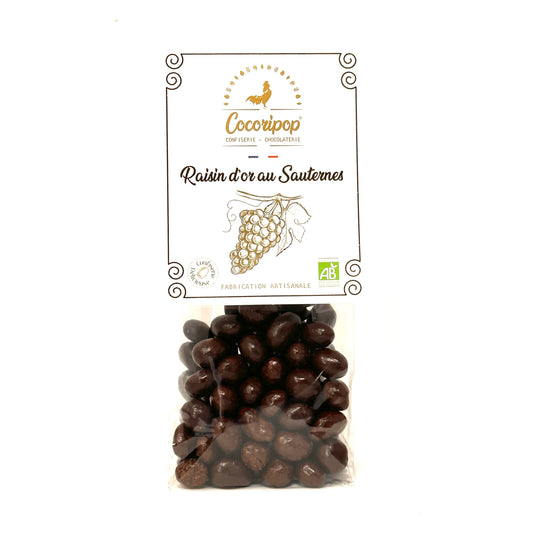 Raisins secs macérés dans du vin blanc Sauternes et enrobés de chocolat noir bio, confiserie artisanale Cocoripop fabriquée en France.