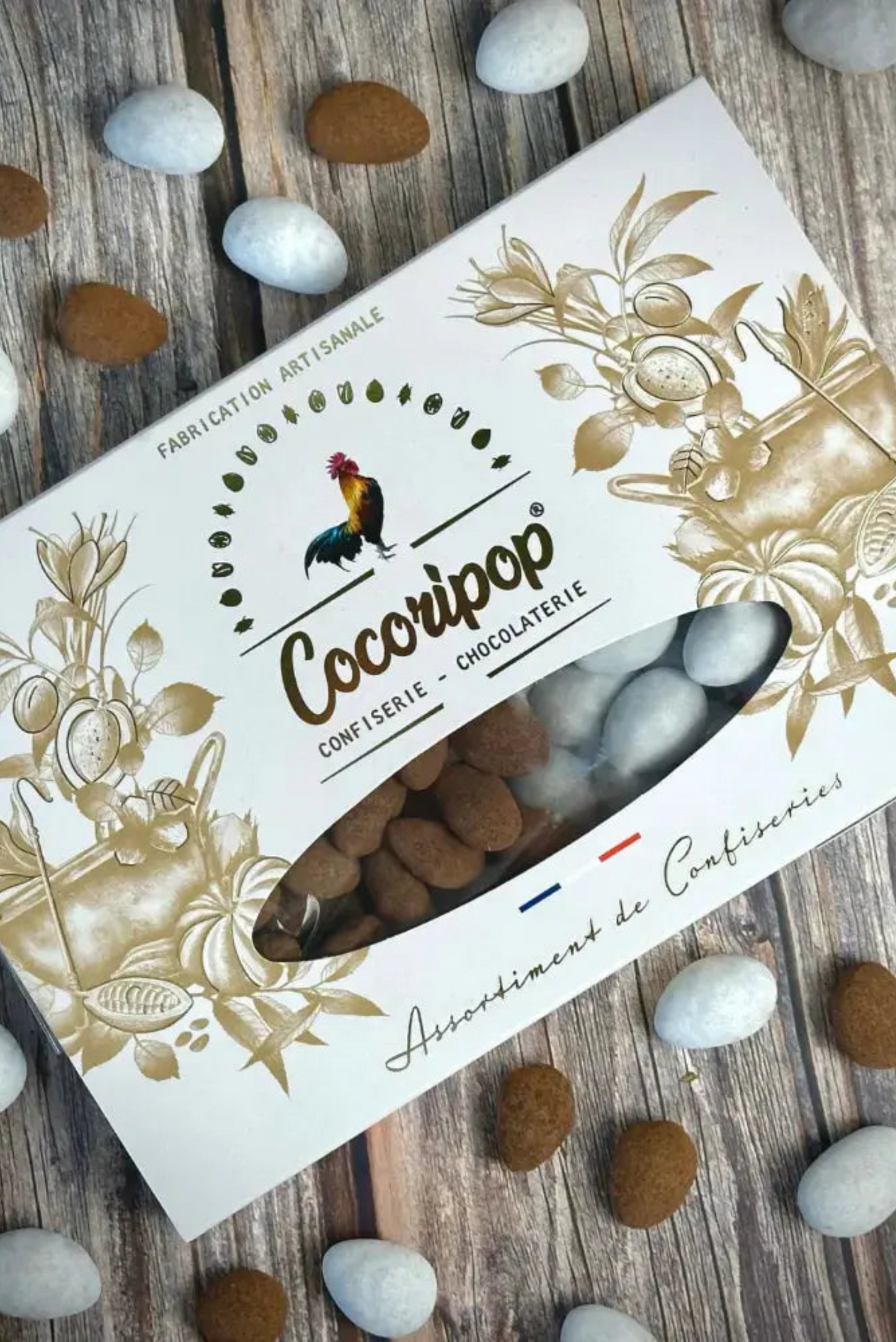 Amandes torréfiées enrobées de chocolat bio et dragéifiées à la main – finesse et croquant subtil