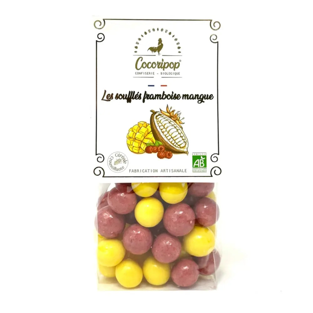 Soufflés duo mangue, billes  croustillantes enrobées de chocolat blanc et parfumées à la mangue et à la framboise, une explosion fruitée et chocolatée. bio