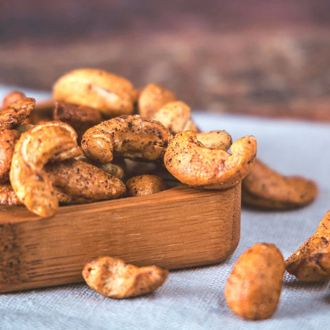Gamme de trois sachets de noix de cajou apéritives bio Cocoripop