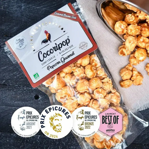 Popcorn bio artisanal français soufflé à l’air chaud, enrobé à la main. Recettes gourmandes médaillées, fabrication 100 % française.
