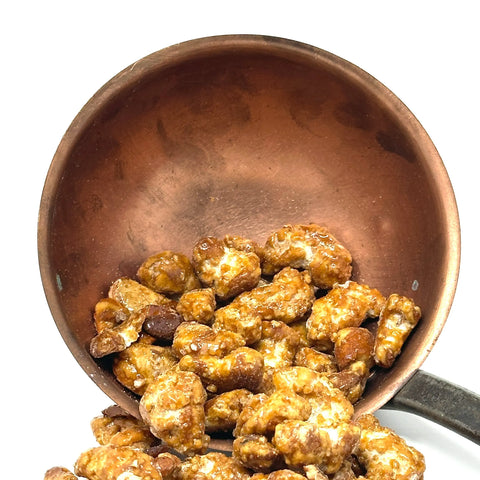 Les Pralines Bio en Vrac Cocoripop : amandes ou noix de cajou torréfiées, enrobées à la main de sucre caramélisé. Un pur plaisir croquant et artisanal !