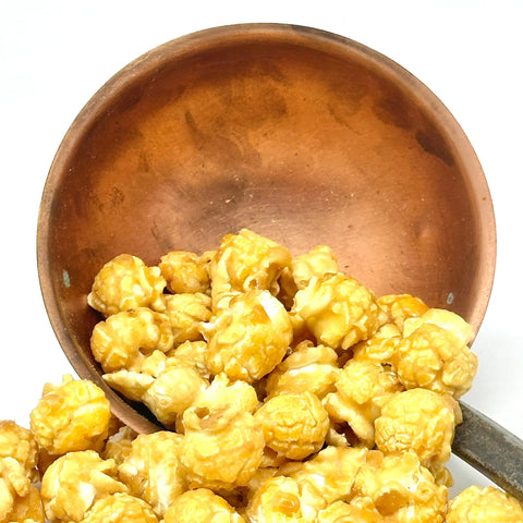 Les Popcorn Gourmet Bio en Vrac Cocoripop : soufflés à l’air chaud, enrobés à la main de caramel, chocolat ou fruits. Croustillants, gourmands et 100 % bio !