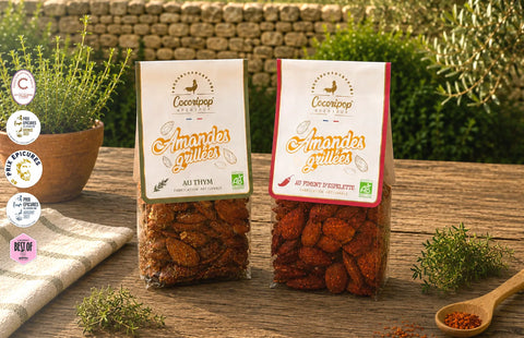 Amande grillee bio au piment d'Espelette et thym, recette artisanale francaise ideale pour l'aperitif sale gourmand. Specialite de confiserie artisanale fabriquee en France.