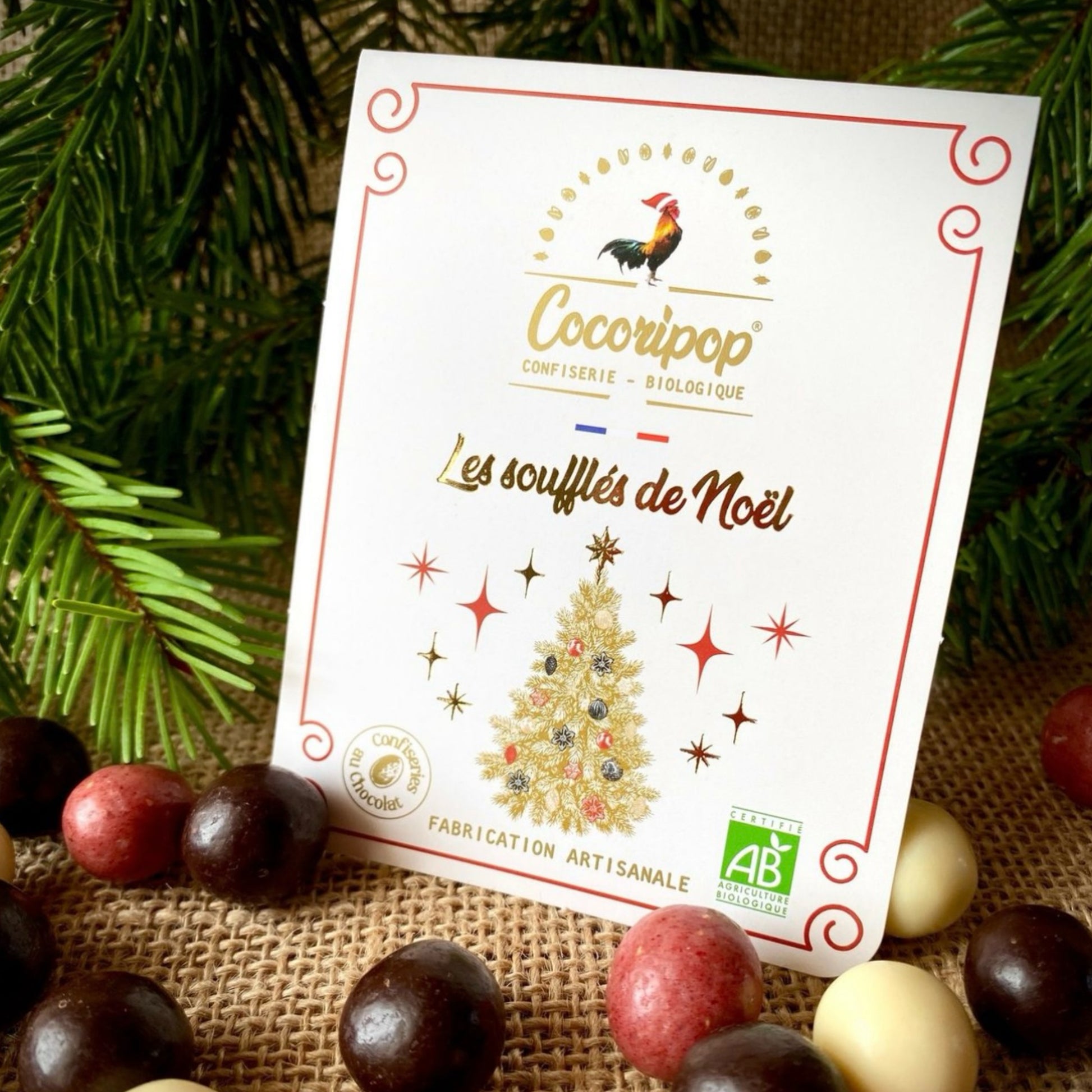 Billes de cereales bio trois chocolats dont un chocolat rouge a la fraise, creation artisanale de Noel Cocoripop