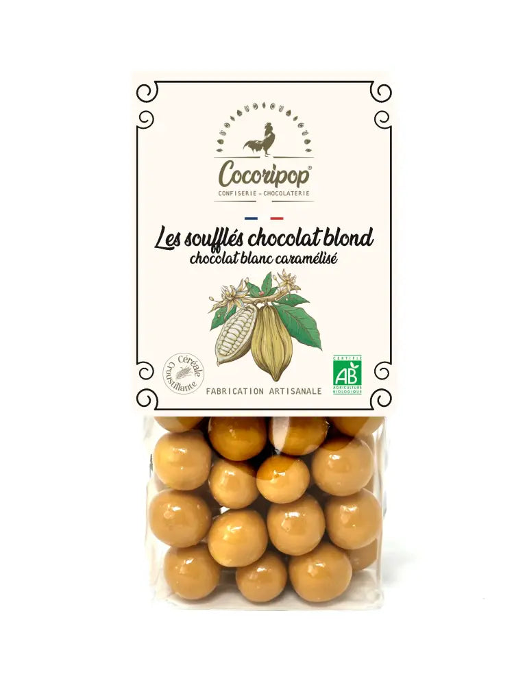Soufflés croustillants enrobés de chocolat blanc et caramel blond, format 100g, confiserie artisanale gourmande sur fond blanc. BIO