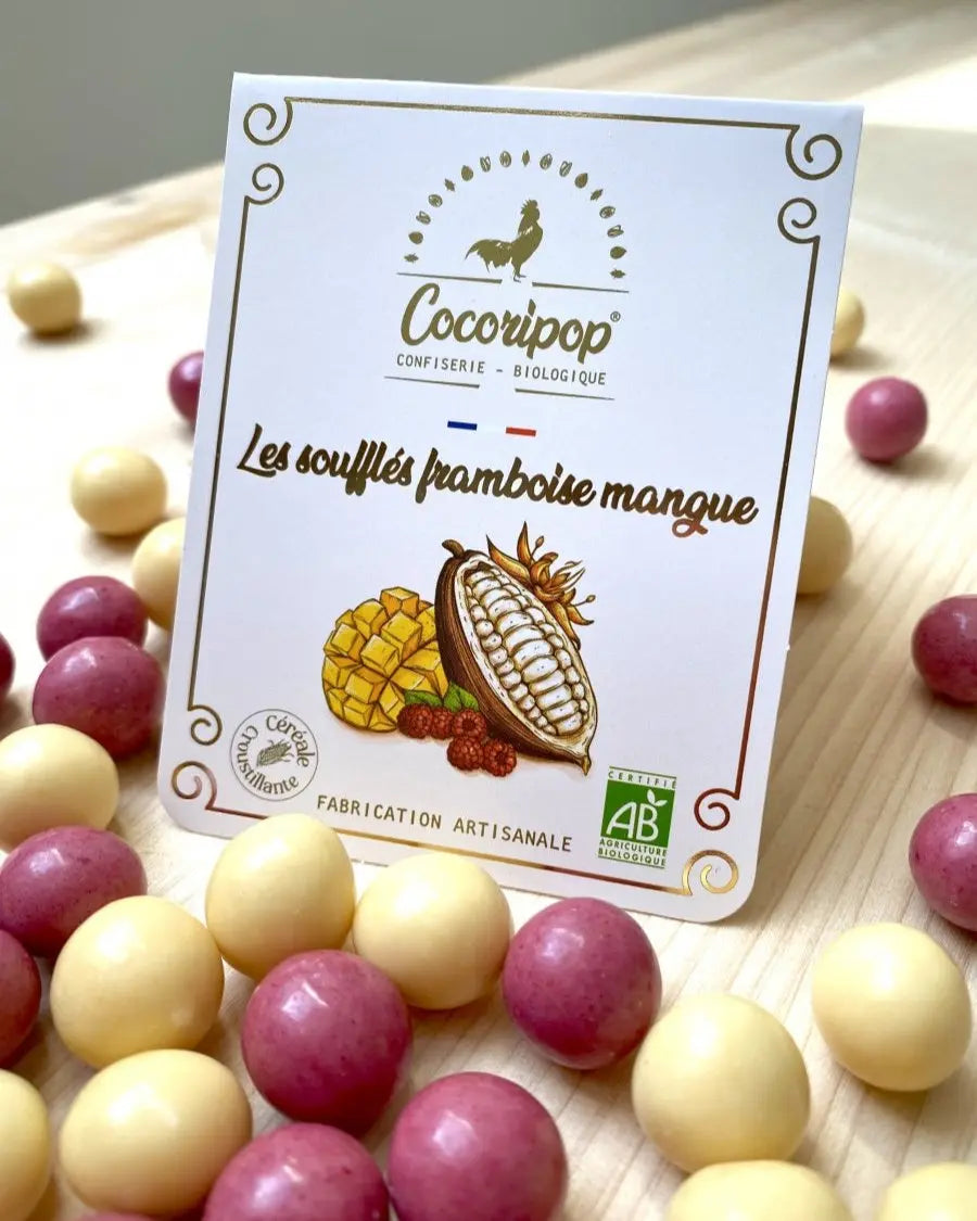 Les Soufflés Framboise Mangue Bio, infusée d’une touche fruitée de mangue et de framboise, offrant une explosion de saveurs, sur fond blanc.bio