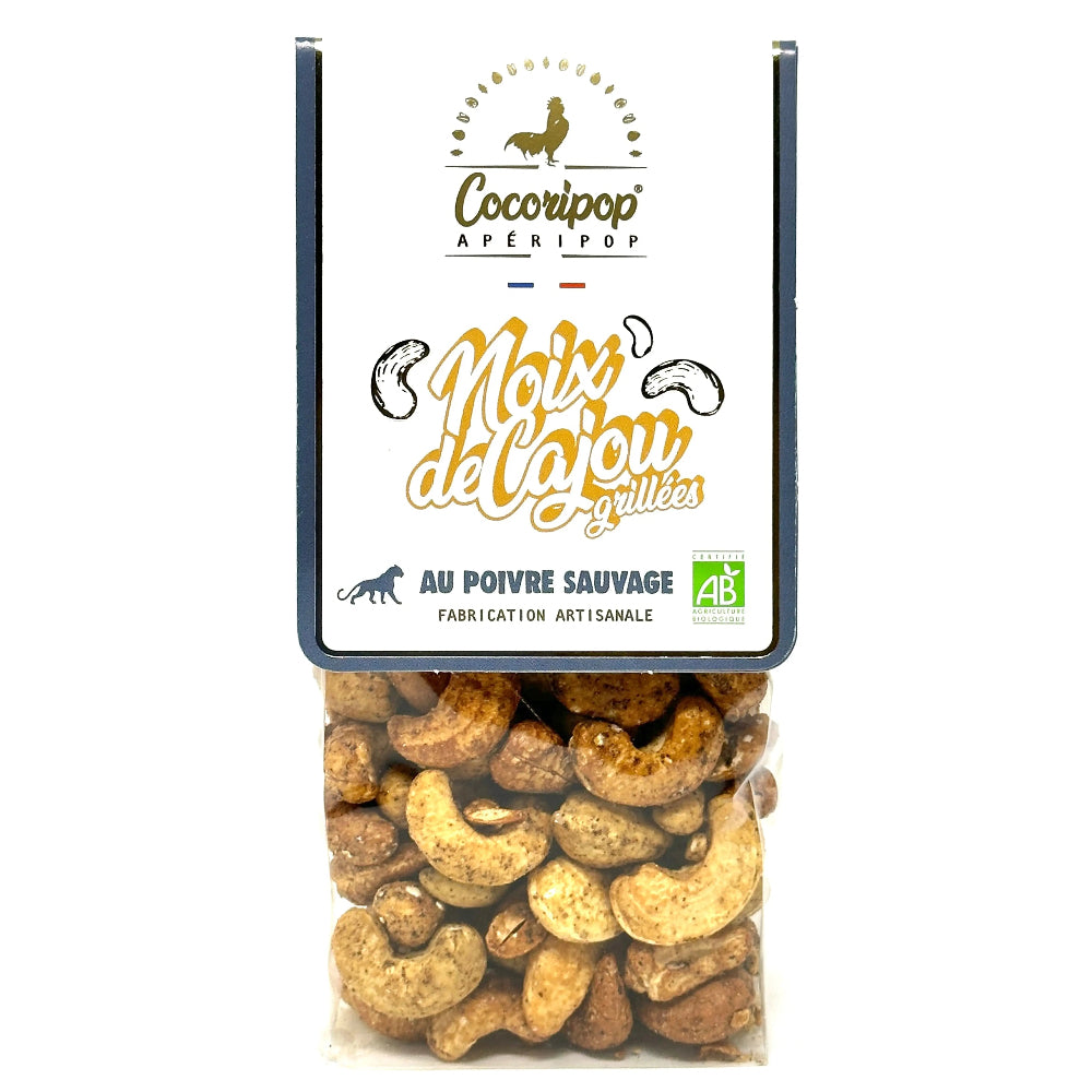 Noix de cajou grillées au poivre sauvage Bio – noix de cajou bio croquantes, légèrement dorées au miel et relevées par un poivre sauvage intense, parfaites pour l’apéritif, présentées sur fond blanc. bio