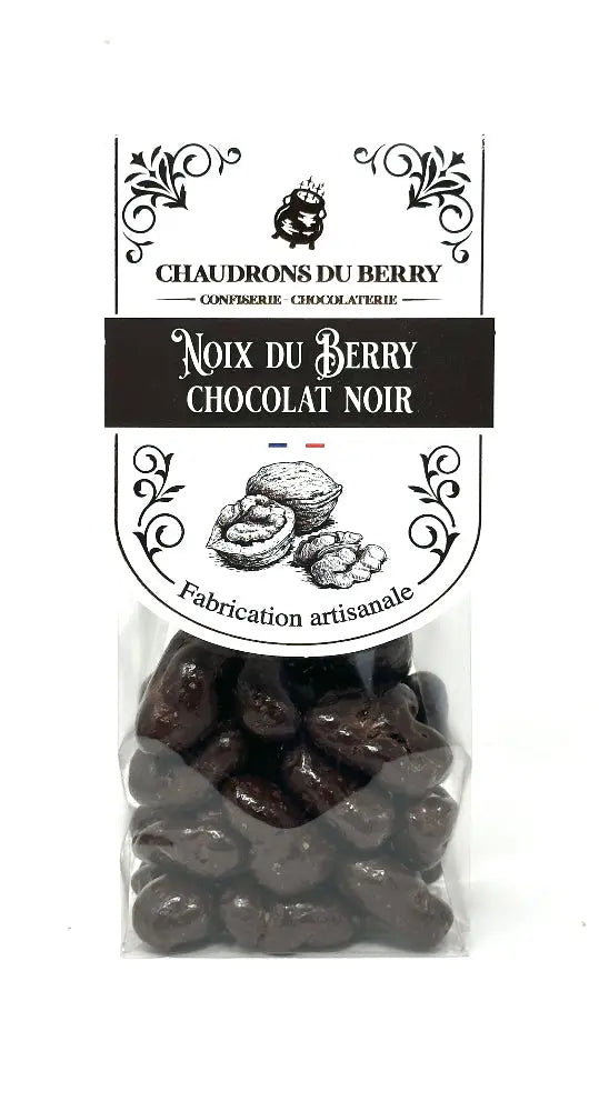 Noix du Berry au Chocolat Noir – cerneaux de noix du Berry torréfiés et enrobés d’un chocolat noir intense et raffiné, une gourmandise artisanale au goût équilibré, présentée sur fond blanc. bio