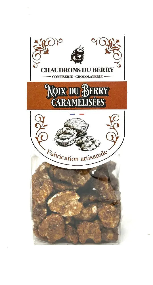 Noix du Berry Caramélisées – cerneaux de noix du Berry torréfiés et enrobés d’un caramel doré, une gourmandise artisanale préparée en chaudron de cuivre, présentée sur fond blanc. bio