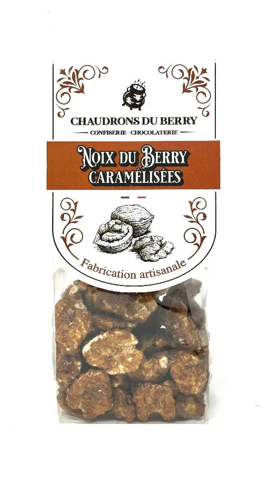 Noix du Berry Caramélisées – cerneaux de noix du Berry torréfiés et enrobés d’un caramel doré, une gourmandise artisanale préparée en chaudron de cuivre, présentée sur fond blanc. bio