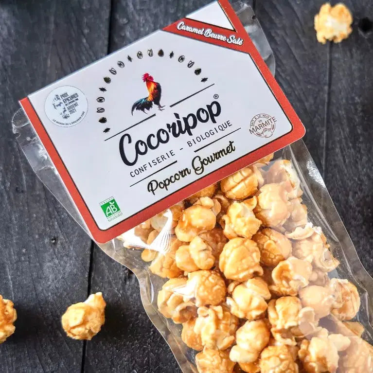 Popcorn Caramel Beurre Salé Bio – Best-seller médaillé d’argent au Salon Epicure Paris 2022. Une explosion de saveurs entre croustillant et douceur caramélisée, mise en scène gourmande et raffinée. BIO