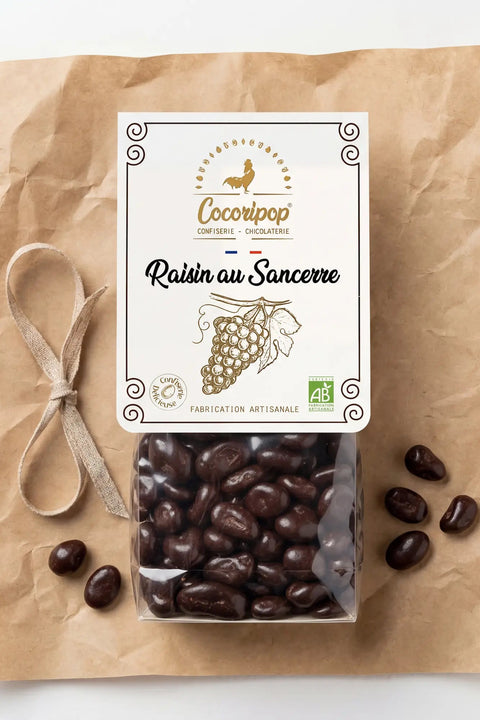Confiserie artisanale francaise de raisins secs au Sancerre enrobes de chocolat noir bio Cocoripop