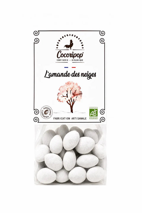 L'Amande des Neiges bio, amande torréfiée dragéifiée au chocolat biologique, fabriquée artisanalement près de Bourges dans le Berry.