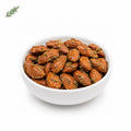 Amandes bio au thym en vrac, fabriquées artisanalement près de Bourges dans le Berry, idéales pour un apéritif gourmand en épicerie fine.