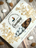 Coffret gourmand composé d'Amandes des Neiges bio et d'Amandes Truffées Cacao bio, fabrication artisanale française à Saint-Germain-du-Puy.
