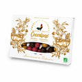 Coffret de chocolats de Noël élégant avec finitions dorées et fenêtre transparente.