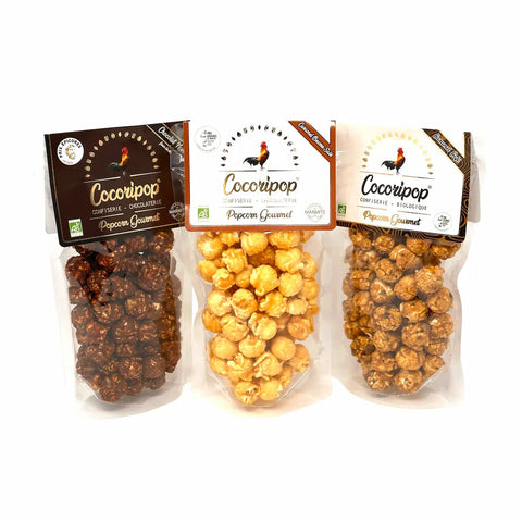 Coffret de popcorns artisanaux bio fabriqué à Saint-Germain-du-Puy comprenant un Popcorn Caramel au Beurre Salé, un Popcorn Chocolat Noir & Fleur de Sel et un Popcorn Caramel & Café.