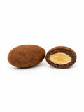 Confiserie artisanale française aux amandes croquantes enrobées de chocolat au lait bio et cacao, fabrication à Saint-Germain-du-Puy dans le Cher