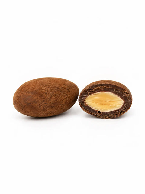 Confiserie artisanale française aux amandes croquantes enrobées de chocolat au lait bio et cacao, fabrication à Saint-Germain-du-Puy dans le Cher
