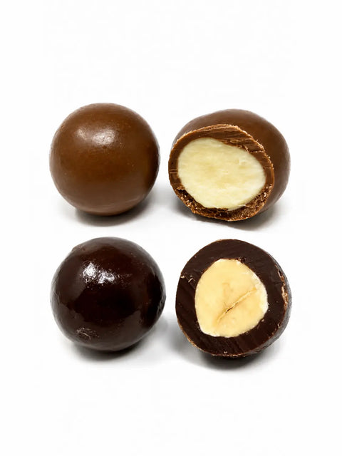 Confiserie artisanale française aux noisettes croquantes enrobées de chocolat au lait et chocolat noir bio, fabrication à Saint-Germain-du-Puy dans le Cher