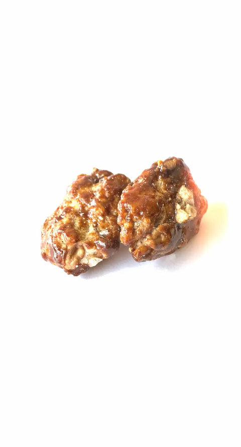 Noix du Berry caramélisées bio élaborées avec des ingrédients issus de l'agriculture biologique selon le savoir-faire artisanal français de Cocoripop.
