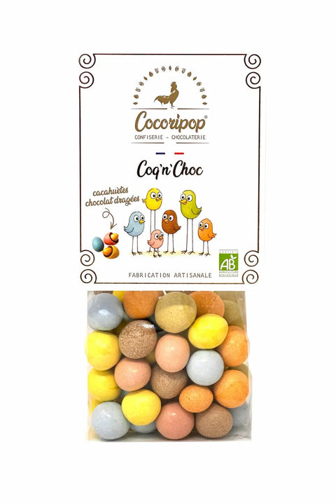 Coq’n’Choc Bio, cacahuètes biologiques torréfiées enrobées de chocolat et dragéifiées artisanalement près de Bourges avec des pigments végétaux naturels.
