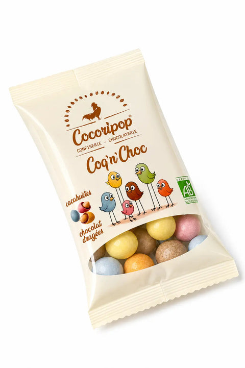 Confiserie artisanale française composée de cacahuètes bio enrobées de chocolat puis dragéifiées avec des colorants végétaux naturels.