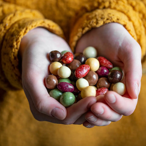 Collection d'enrobés chocolat bio artisanaux fabriqués en France avec des ingrédients biologiques.