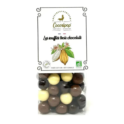 Billes croustillantes enrobées de chocolat noir, lait et blanc, offrant un jeu de textures gourmand et équilibré bio
