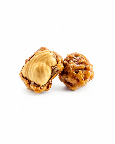 Noisettes bio caramélisées, confiserie artisanale française élaborée à Saint-Germain-du-Puy près de Bourges selon un savoir-faire traditionnel.