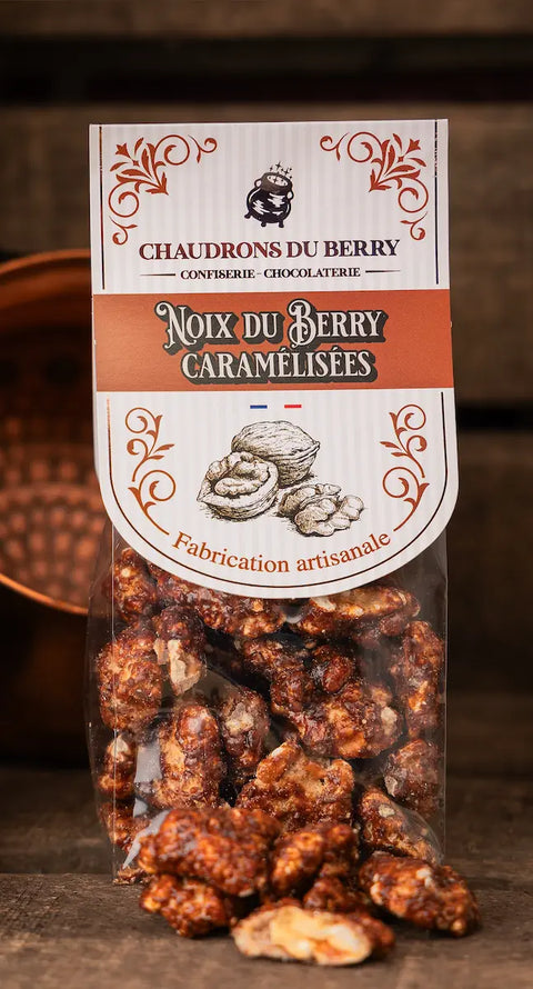 Confiserie artisanale française composée de noix du Berry torréfiées et délicatement caramélisées avec du sucre de canne blond bio, fabriquée à Saint-Germain-du-Puy.