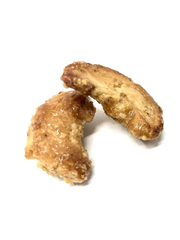 Pralines Noix de Cajou Bio enrobées de sucre blond caramélisé, une douceur croquante aux notes subtiles et raffinées. bio