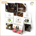 Pack Bio Douceurs Chocolatées Cocoripop composé de popcorn chocolat caramel, popcorn chocolat noir fleur de sel, soufflés trois chocolats, noisettes enrobées de chocolat noir et lait et pralines amandes cacao, assortiment artisanal bio fabriqué à Saint-Germain-du-Puy près de Bourges.