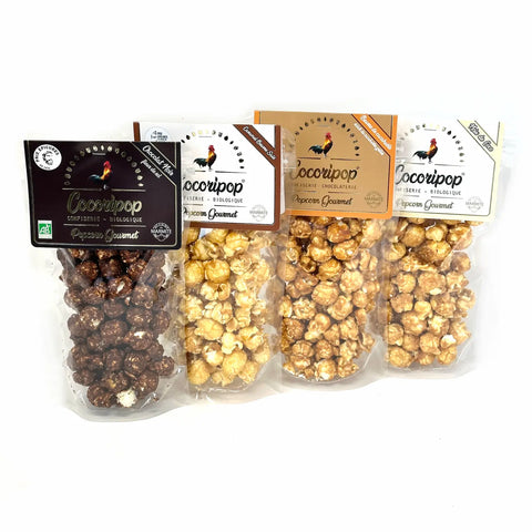 Le Pack Bio Popcorn Gourmet - 4 Saveurs Artisanales Cocoripop, coffret gourmand composé de popcorns artisanaux bio fabriqués en France à Saint-Germain-du-Puy, près de Bourges : caramel beurre salé, chocolat noir fleur de sel, beurre de cacahuète et chocolat caramel.