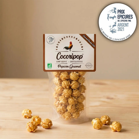 Popcorn caramel au beurre salé bio Cocoripop, médaillé d'argent au Prix Épicure de l'Épicerie Fine. Popcorn artisanal français fabriqué à Saint-Germain-du-Puy près de Bourges, enrobé à la main d'un caramel à la fleur de sel de Guérande.