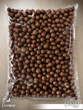 Billes de maïs soufflé bio enrobées de chocolat au lait fabriquées artisanalement à Saint-Germain-du-Puy près de Bourges.
