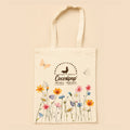Tote Bag Échappée Fleurie Cocoripop au motif floral coloré, aux couleurs de notre confiserie artisanale située près de Bourges.