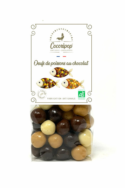 Œufs de poisson soufflés enrobés de chocolat français bio blanc, blond, lait et noir.
